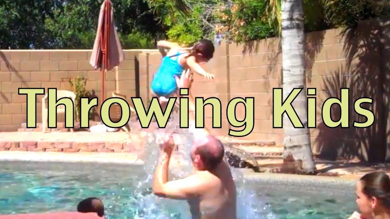 THROWING KIDS IN THE POOL