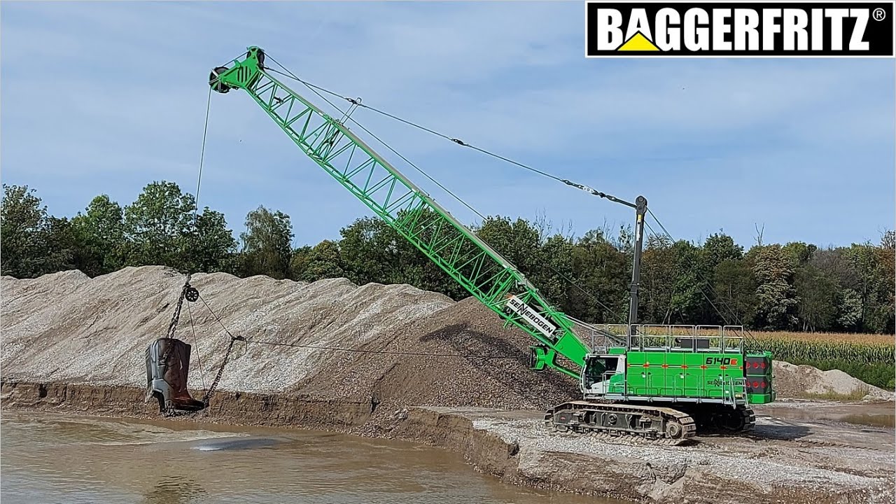 HUGE Sennebogen 6140E dragline is digging gravel with Esco bucket