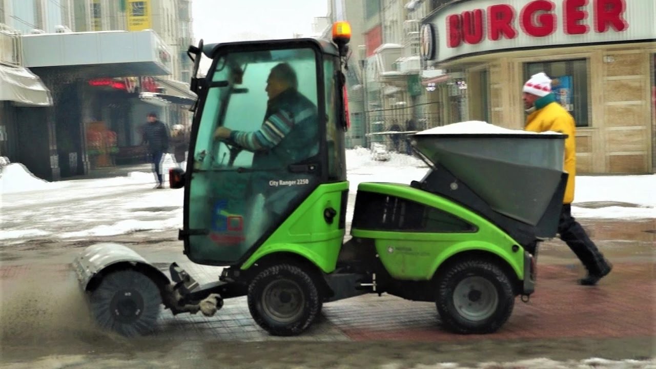 Nilfisk Street Sweeper Skills on the Job: Snow Plowing / Brush / Utility Work Machine