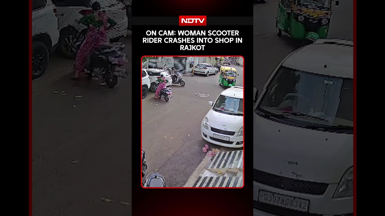 On Camera, Woman Scooter Rider Crashes Into Shop Shutter In Rajkot, No Injuries Reported