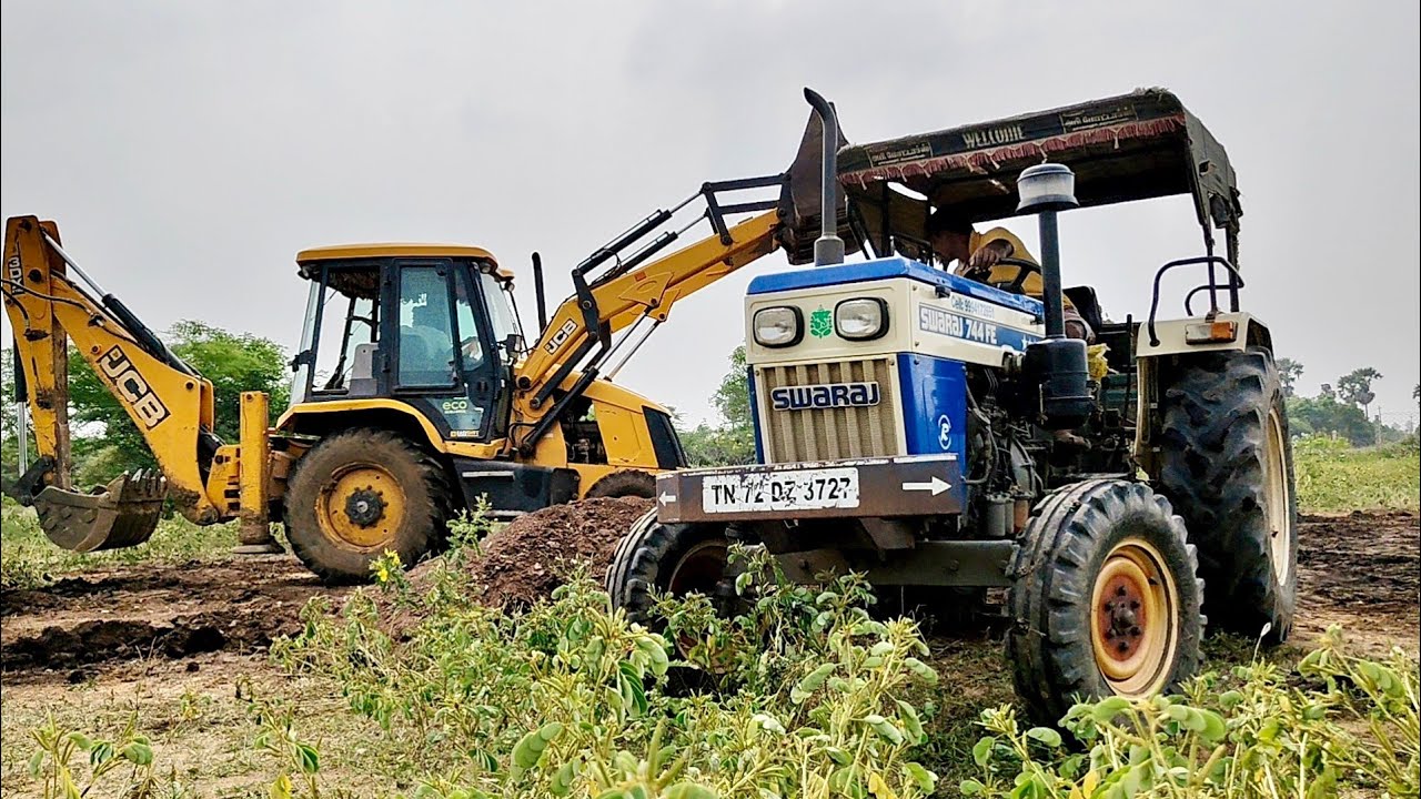 Jcb 3dx working for loading cow dung in two tractors swaraj 735fe and kobota mu4501 || JCB Video