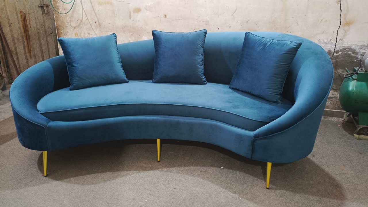 blue velvet covered sofa gold legs