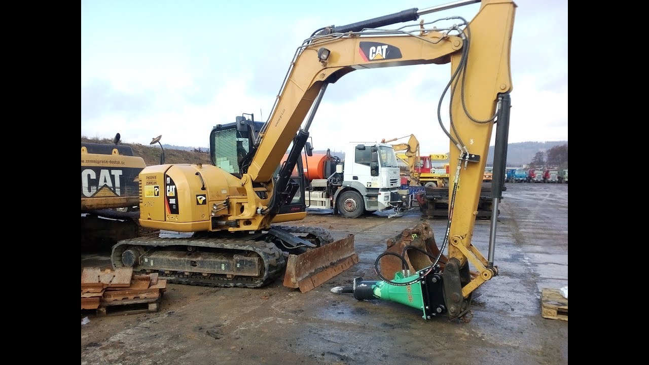 CAT 308E with hydraulic hammer MONTABERT SC-36