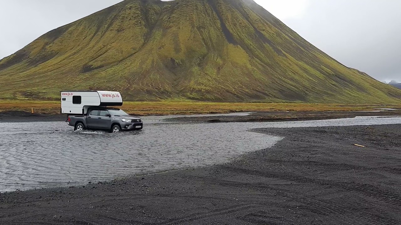 Crossing a River in Iceland with a Toyota Hilux Camper