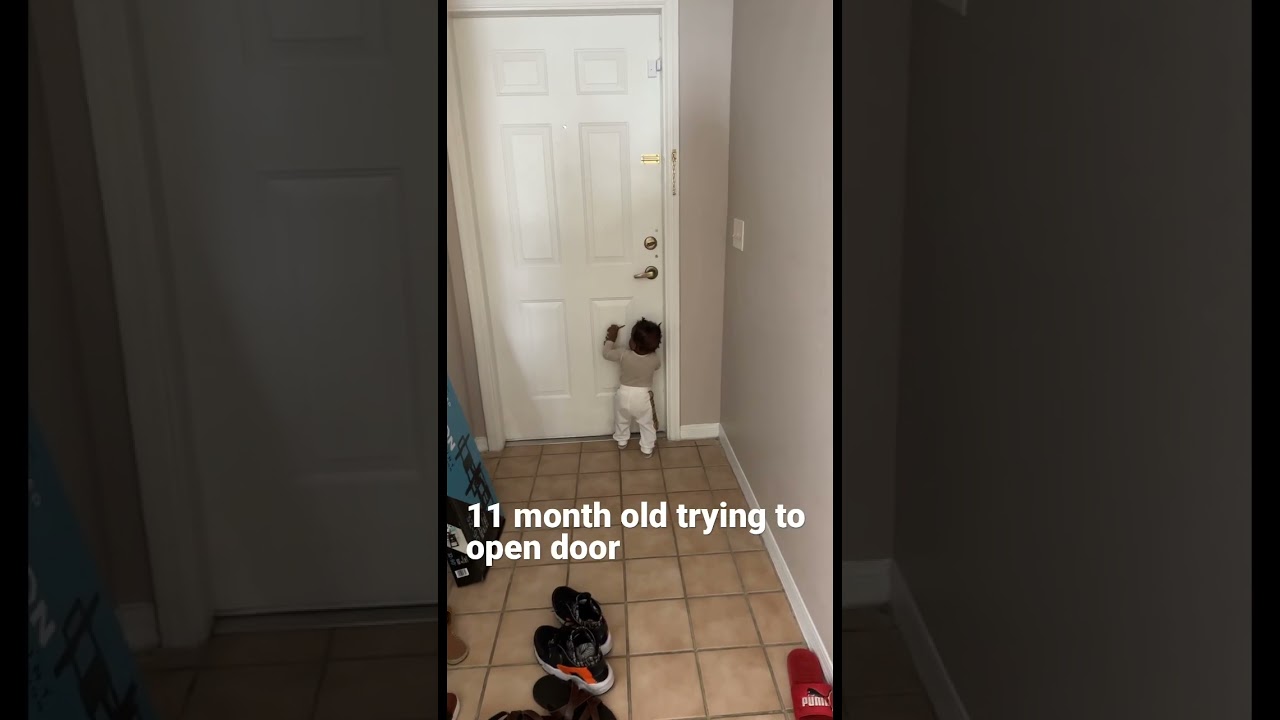 11 month old trying to open door #baby #shorts
