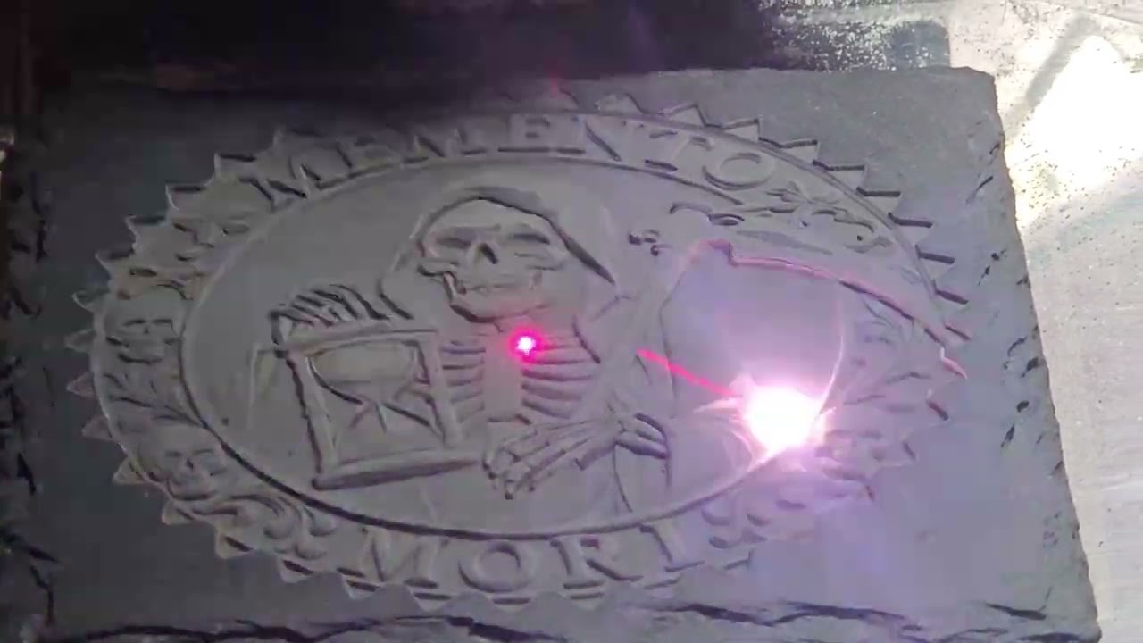 Laser engraving into slate using the Commarker Mopa 60 watt laser.