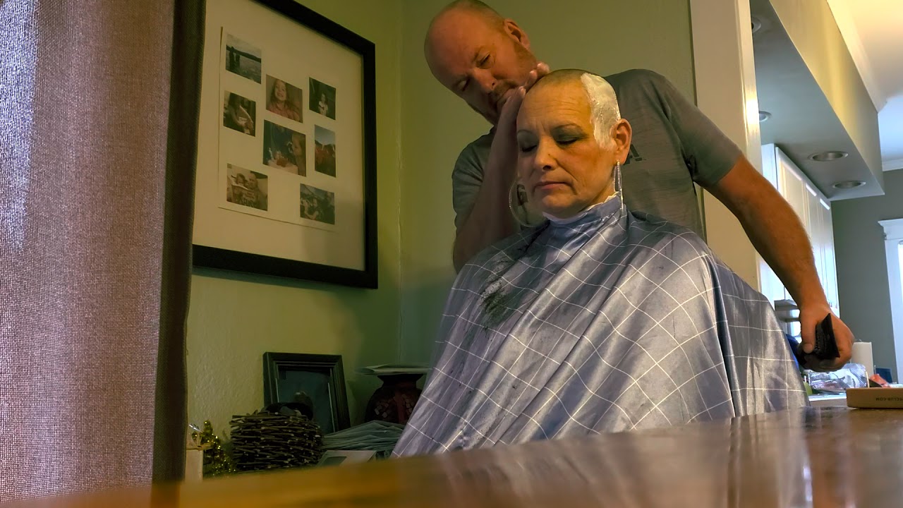 bald angel dolled up for a shave