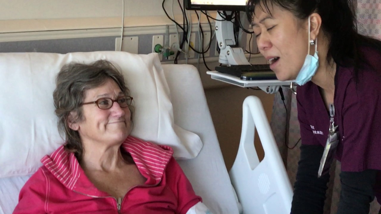 Memorial Hospital nursing assistant sings to patients
