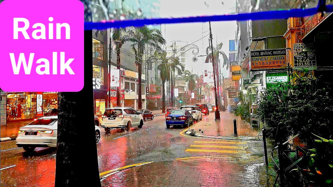 Walking in the Rain (Vid-70) from Bukit Bintang to Jalan Raja Chulan in Kuala Lumpur, Malaysia.