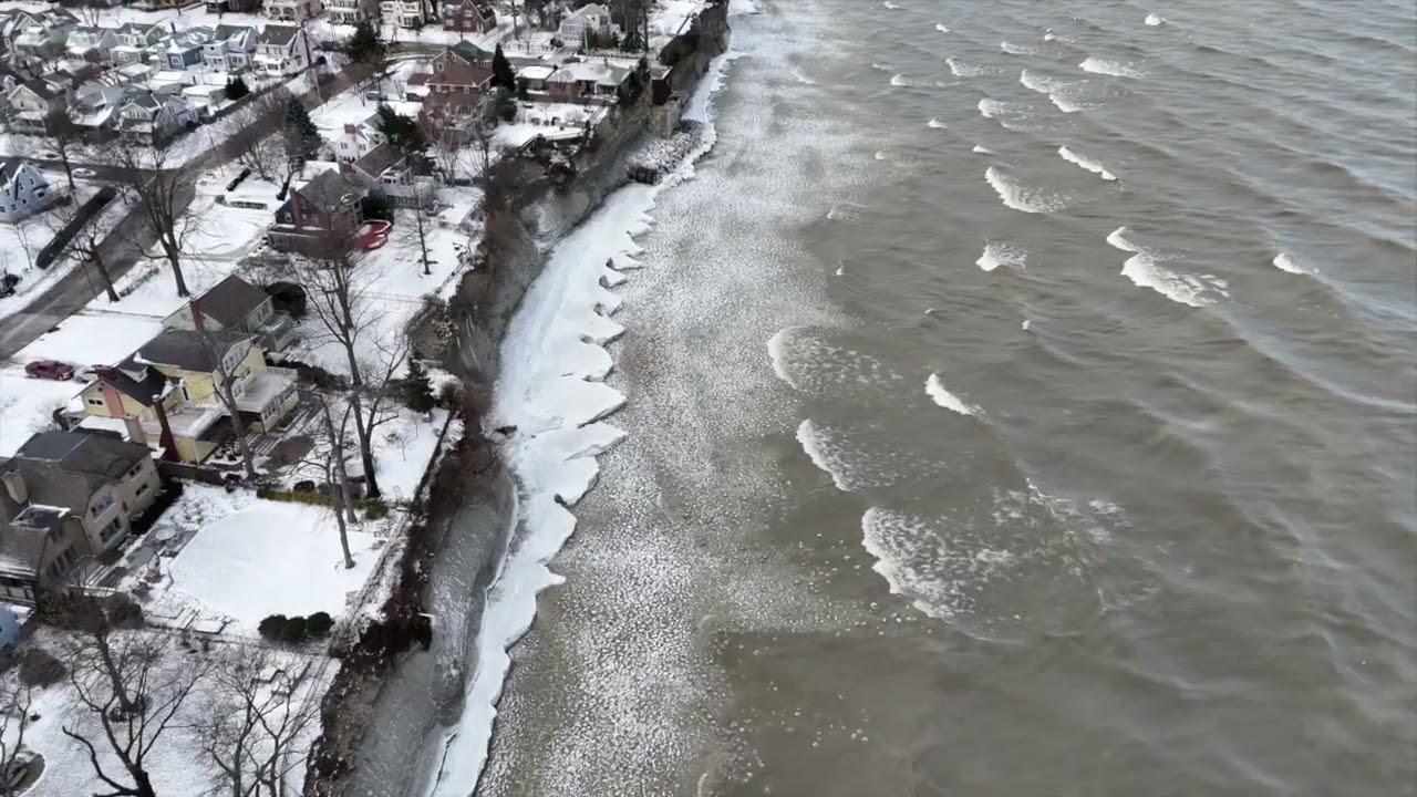 Drone Footage Of Waves Crashing On Icy Lake Erie shoreline