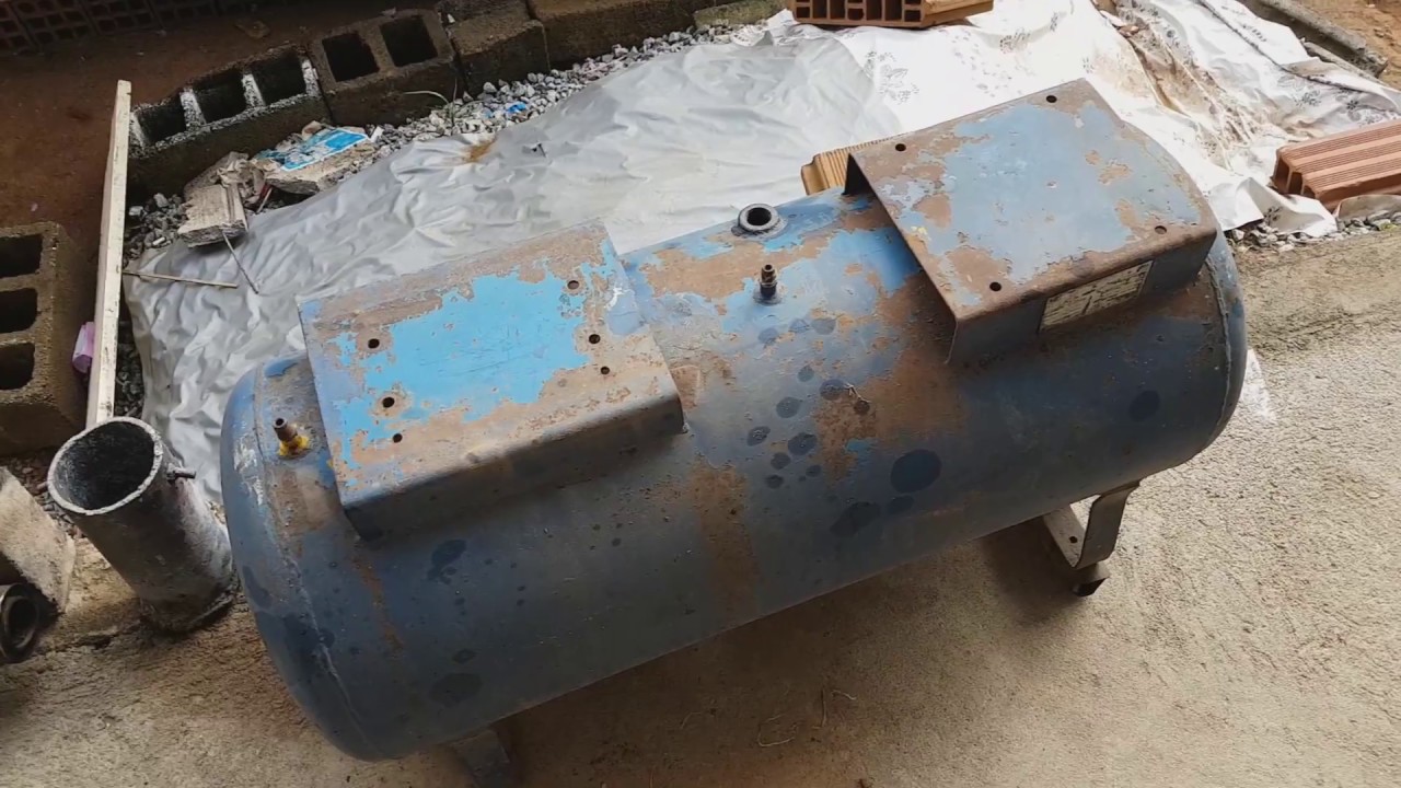 limpando e pintando cilindro para comprensor