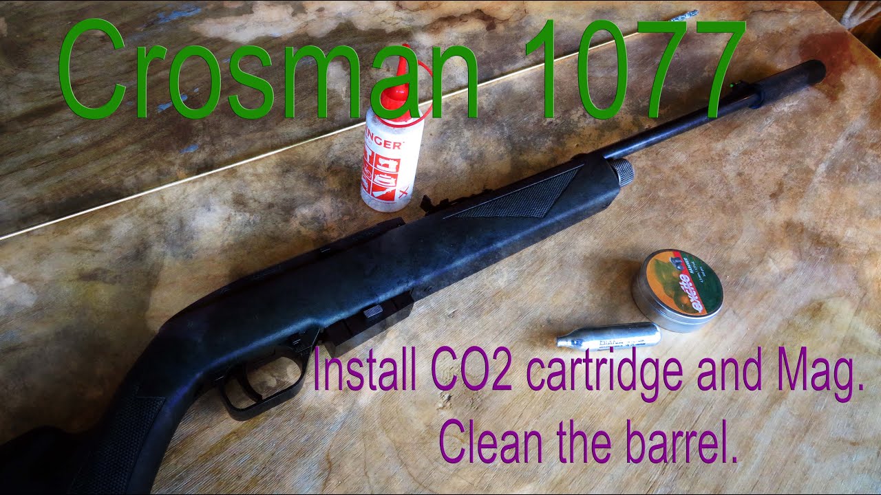 Crosman 1077 air gun - Installing CO2 cartridge and Mag. Clean the barrel.