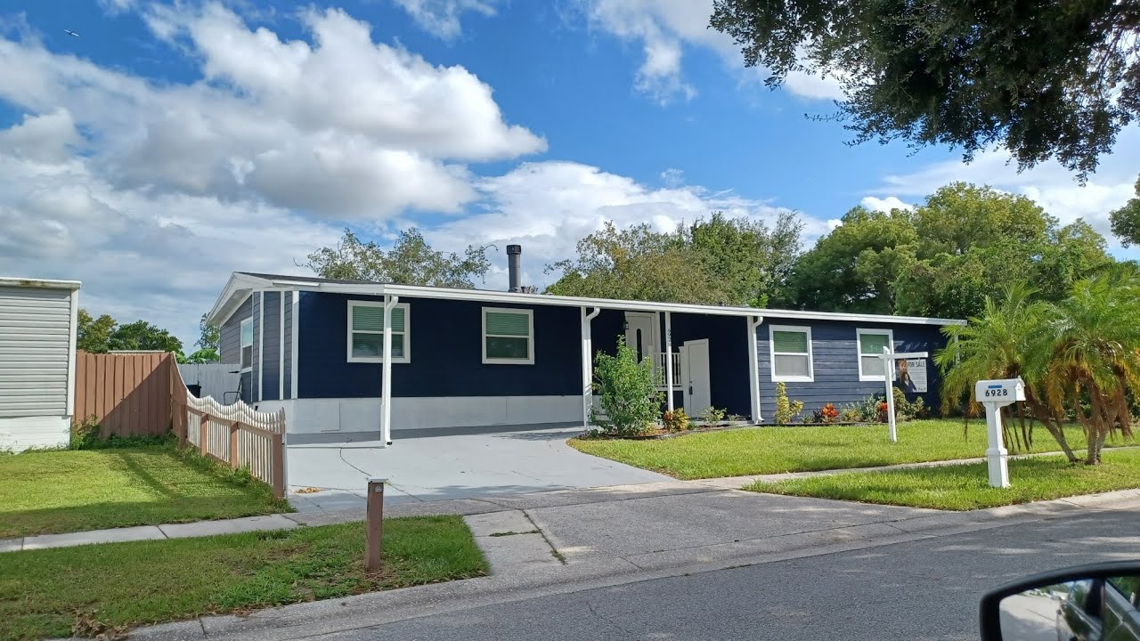 Se Vende Hermoso Mobile Home con Terreno de 4 Dormitorios 3.5 Baños en Orlando, Florida 32822