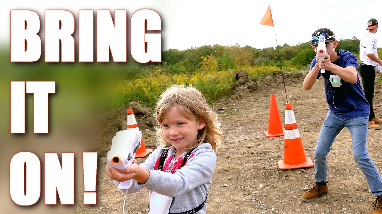 FAMILY BATTLES IT OUT! 😠 EPIC LASER X BLASTER CHALLENGE (with DRONE FOOTAGE) NEW REVOLUTION BLASTER