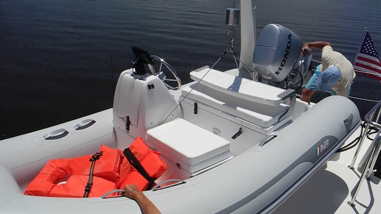 Hoisting the dinghy