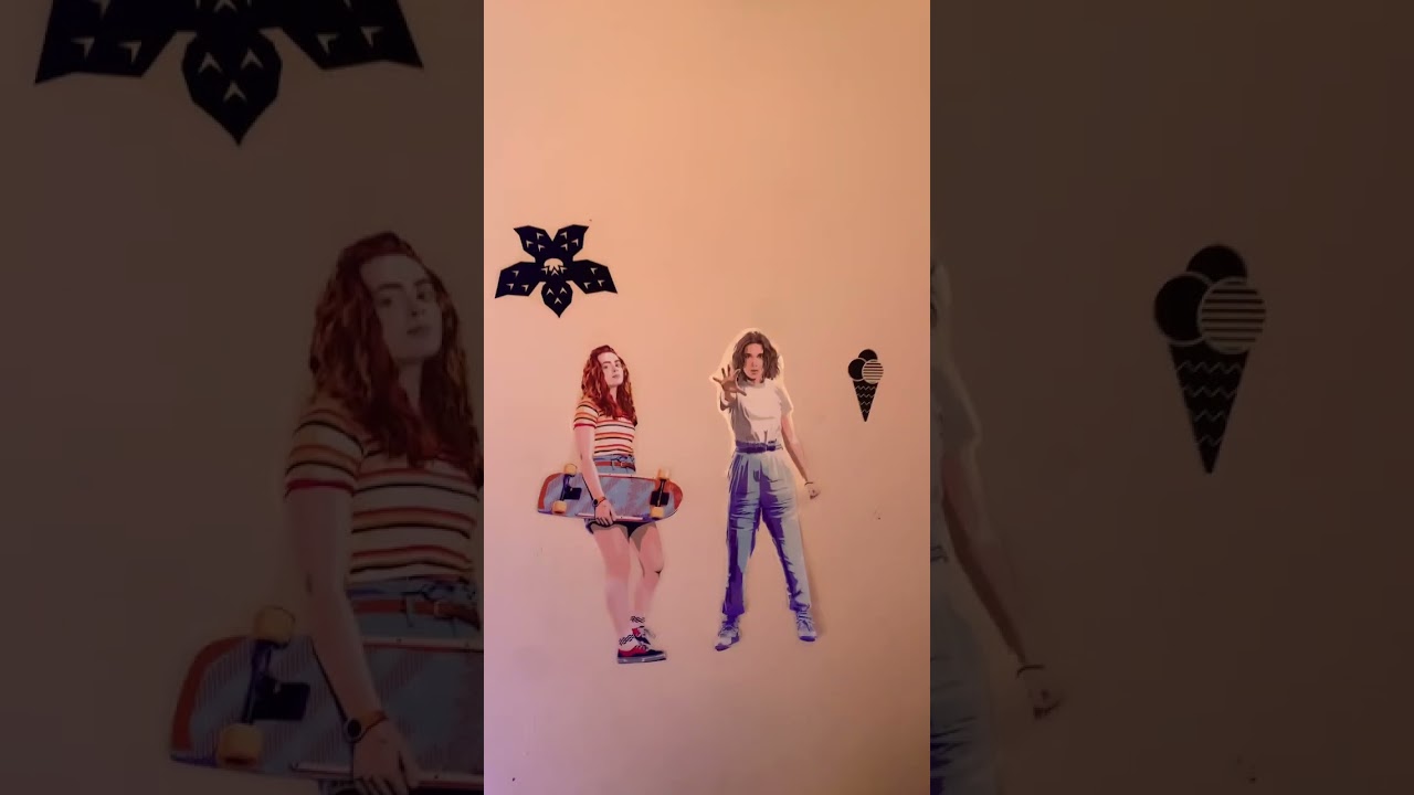 Putting stranger things stickers on my walls! Don&rsquo;t mind the end with the watermark 🫶