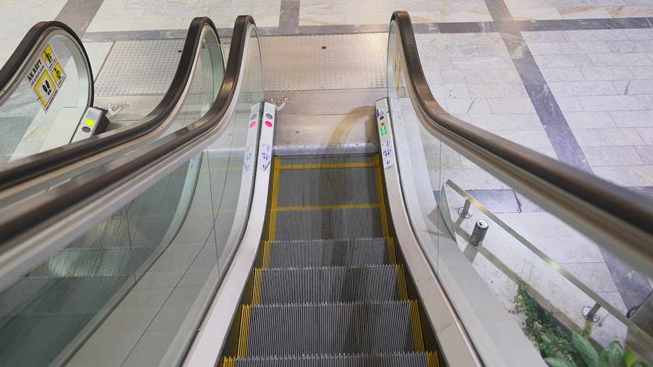 Sweden, Stockholm, Skog&aring;s Centrum, 2X escalator