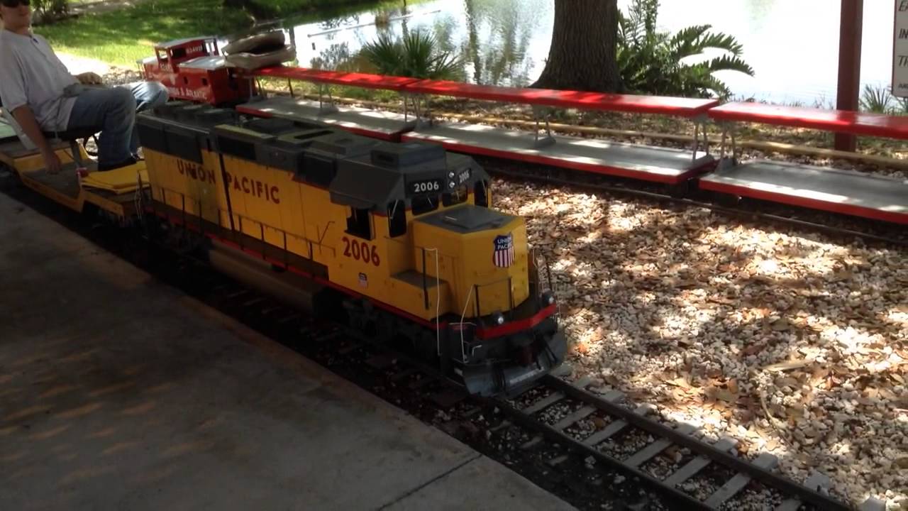 Tradewinds and Atlantic Railroad Union Pacific EMD GP60 enters train station 6-22-14