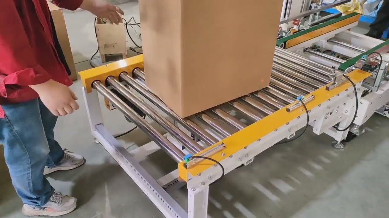 Fully automatic carton corner sealing machine#EndOfLinePackaging #industrialsolutions