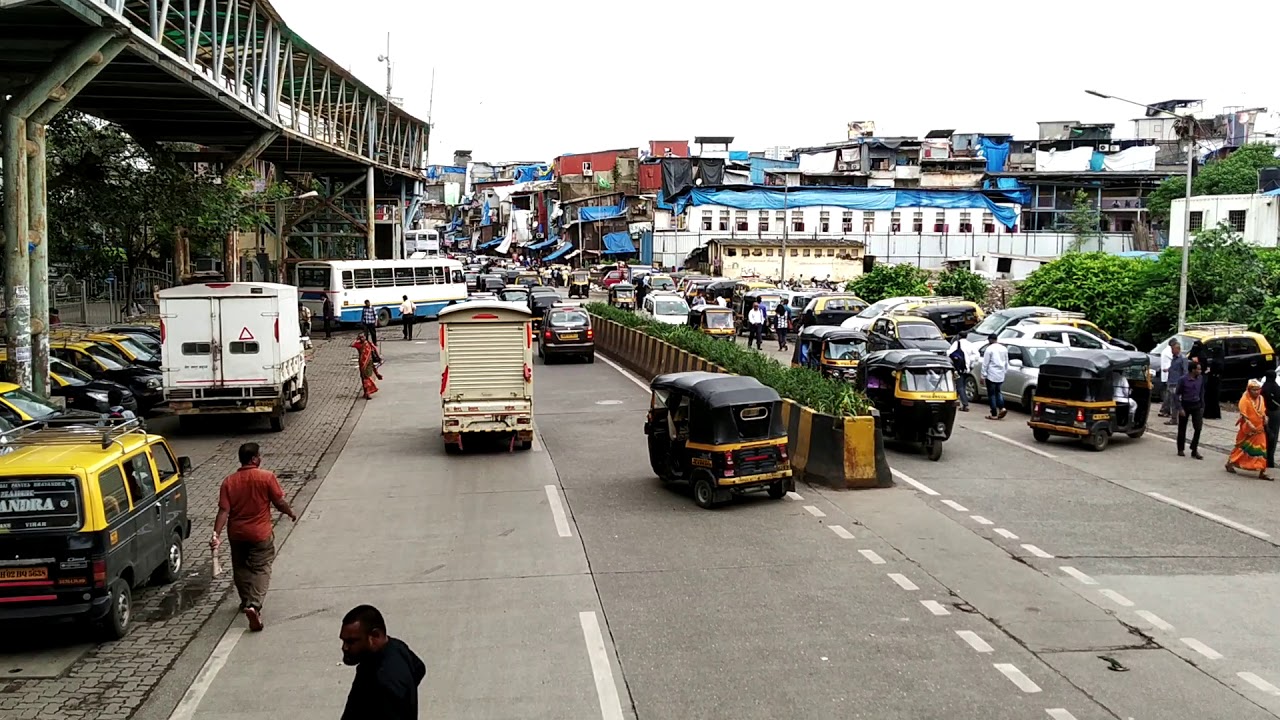Bandra east near court,  traffic and people.