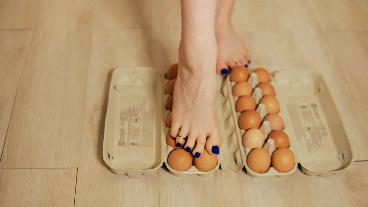 Crushing eggs with my Pedicured Barefeet