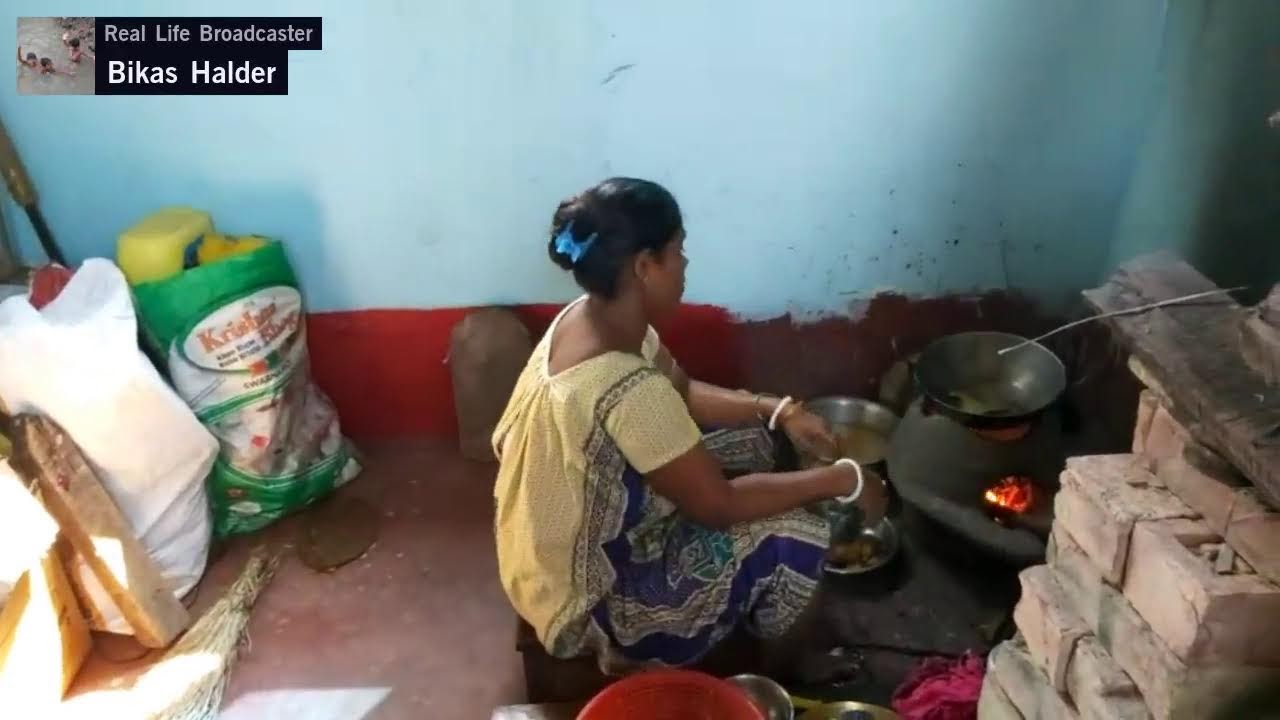 Cooking by mud stove from India, West Bengal