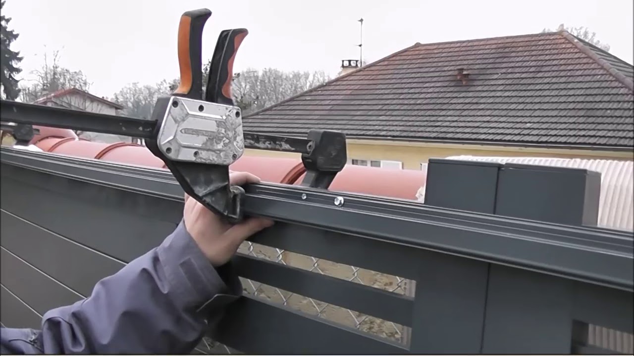 Installation d'un portail coulissant NFI