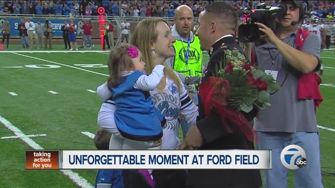 Marine from Grand Rapids surprises wife at Detroit Lions game