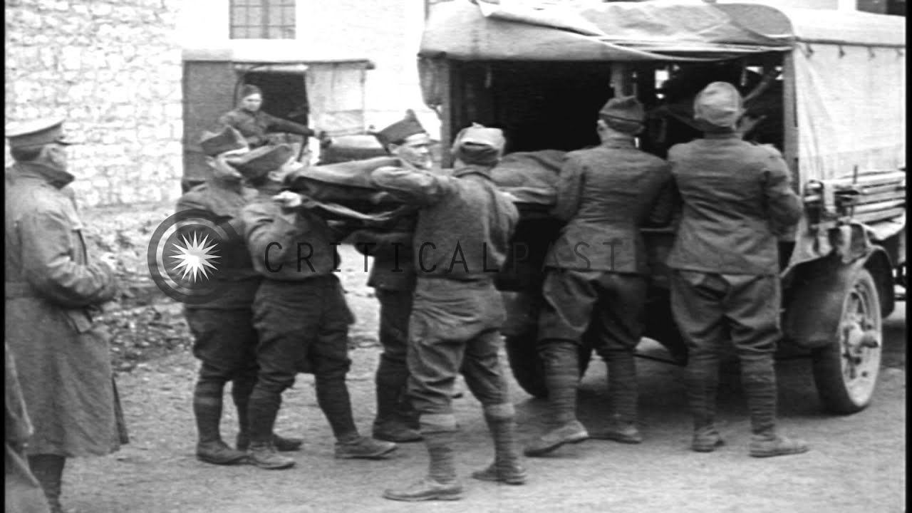 Wounded US soldiers on litters are placed into an American Expeditionary Force ho...HD Stock Footage