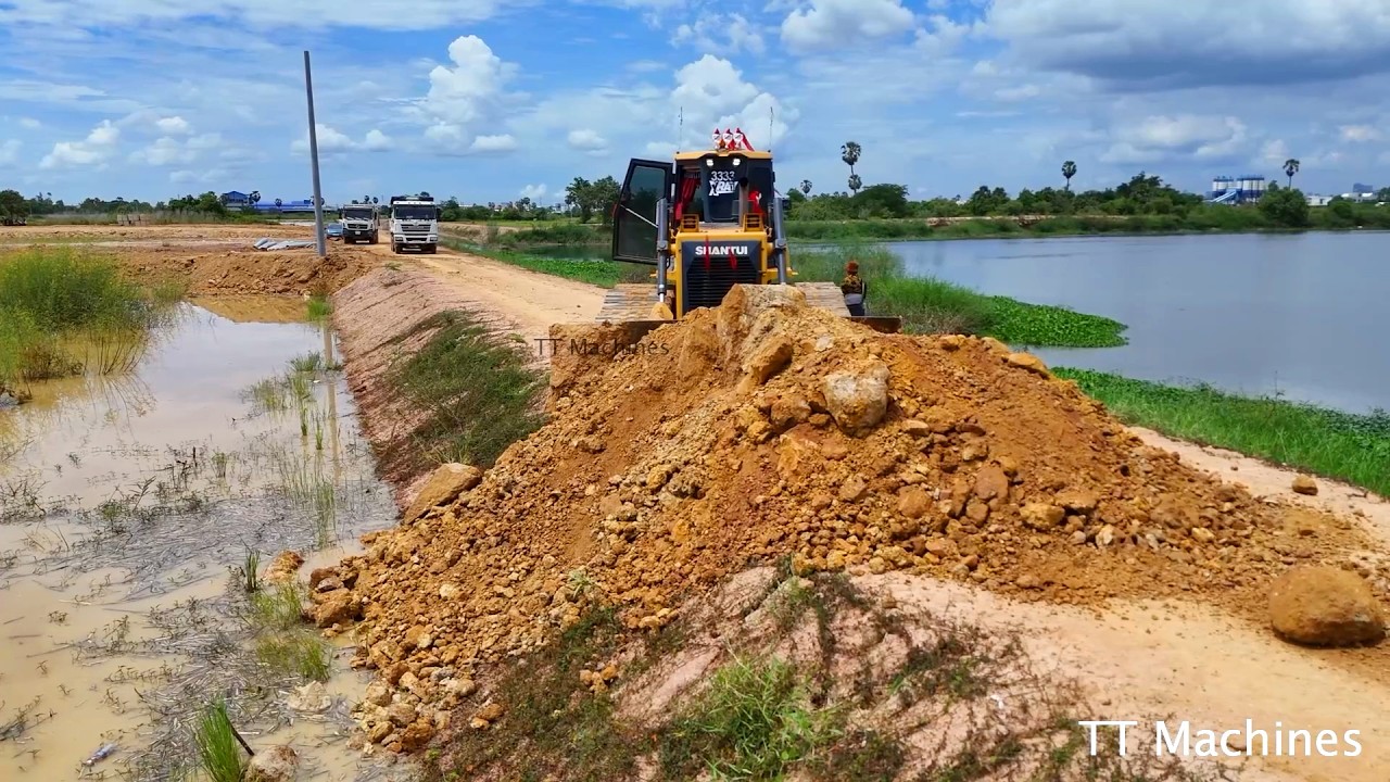 Unbelievable Small Land Size Making MV Concrete System Use Shantui Dozer Push Stone Into Water