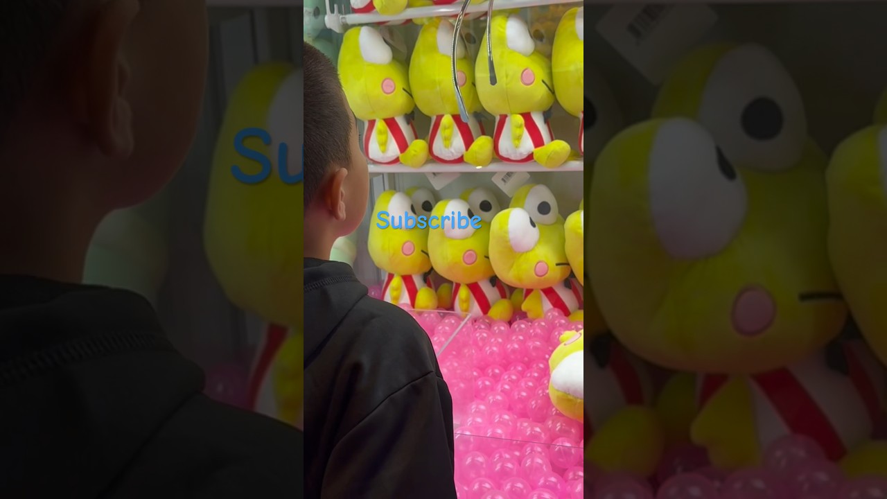 Ayden Playing The Croppie Claw Machine At Round 1 