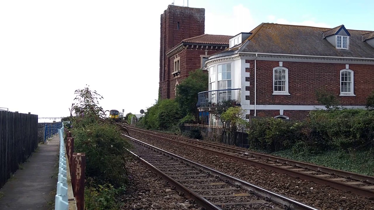 Trains. Class 143 Pacer works the Riviera Line past Brunel's Atmospheric Railway Pumping Station
