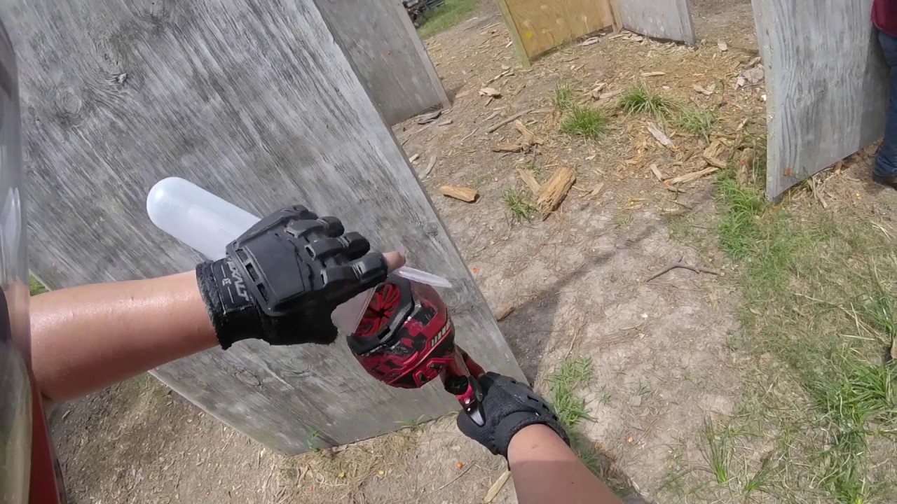 Guy get lit up by paintball gun