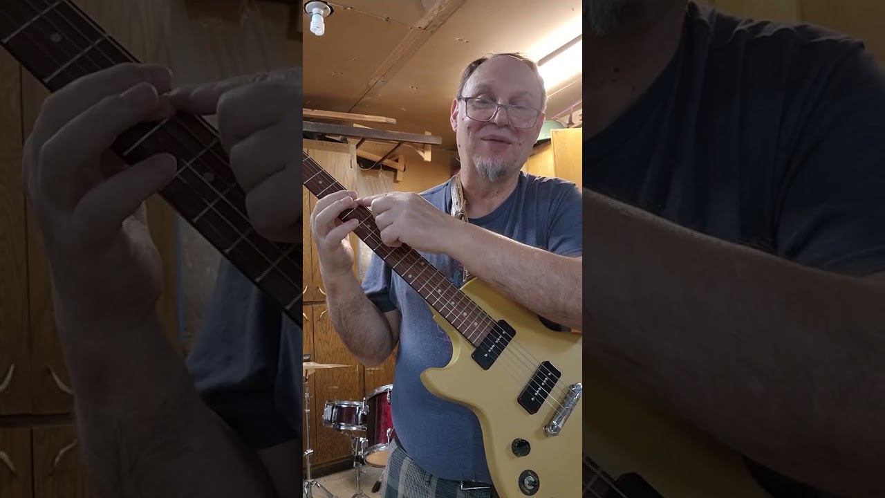 Why are guitar harmonics where they are?