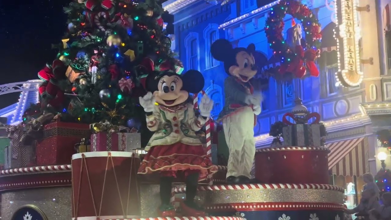 Mickey, Minnie, Alice, Pinocchio, Winnie the Pooh during Christmas Parade at Magic Kingdom 