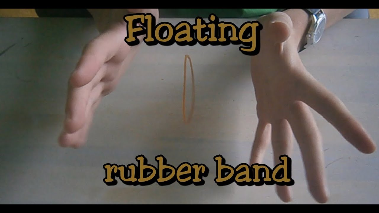 Floating rubber band (magic trick)