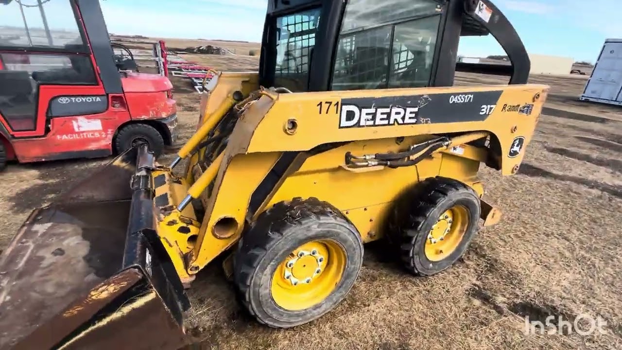 Lot 13 B 2004 John Deere 317 skid steer
