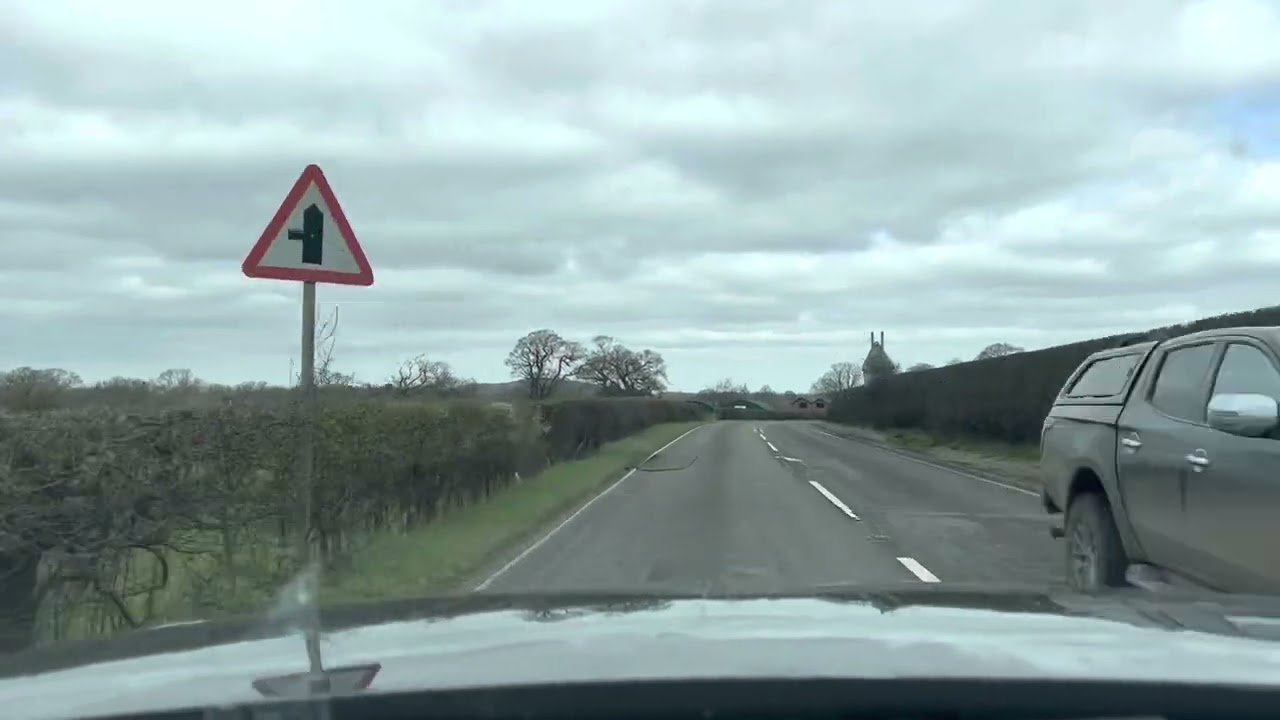A country drive into Cheshire passing through the town of Malpas