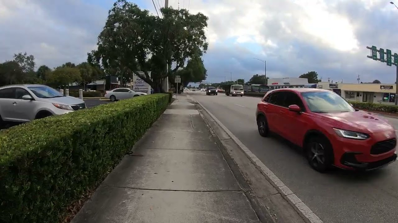 Walking south on Coconut Creek Pkwy towards Atlantic Blvd on 441