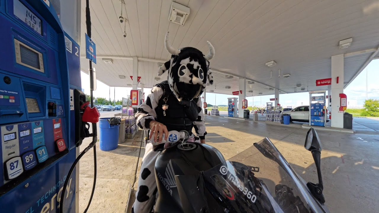 MotoVlog 1 - Poured milk in my tank, almost got robbed, joined a music video, partook in a foot race
