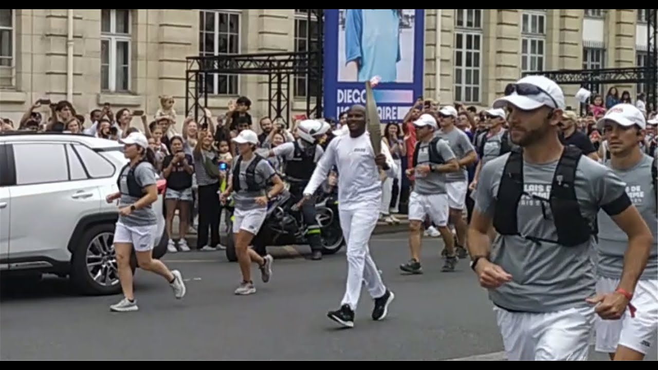 14 juillet 2024 Passage de la Flamme Olympique à Paris