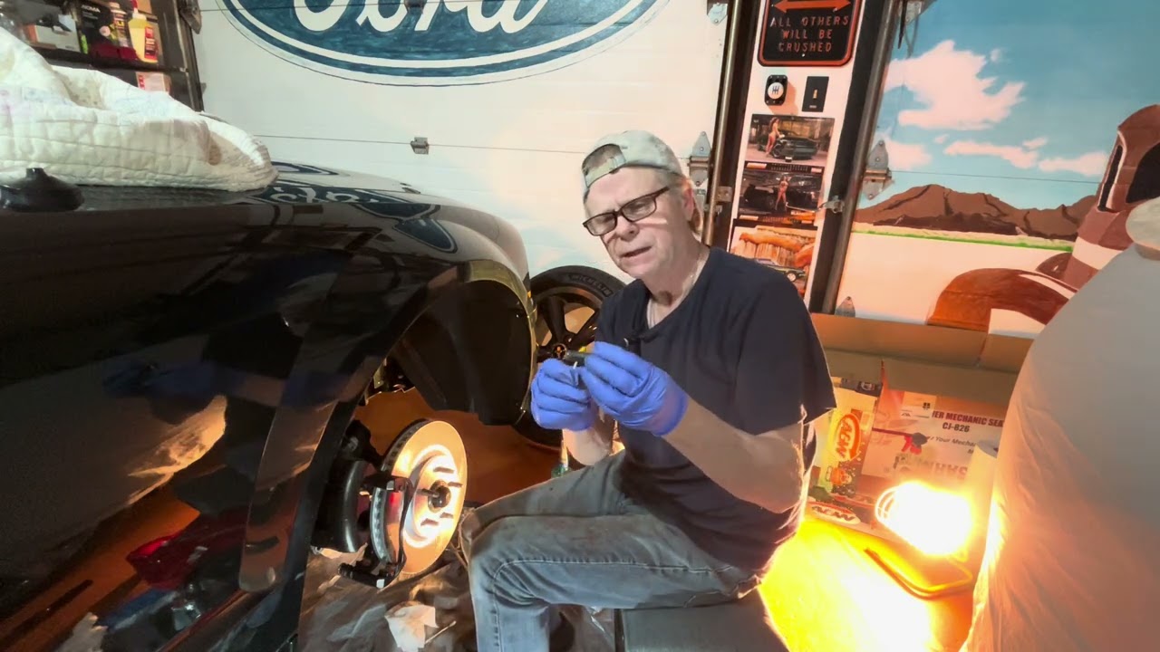 Installing the rotor, caliper bracket and caliper on the front passenger side 