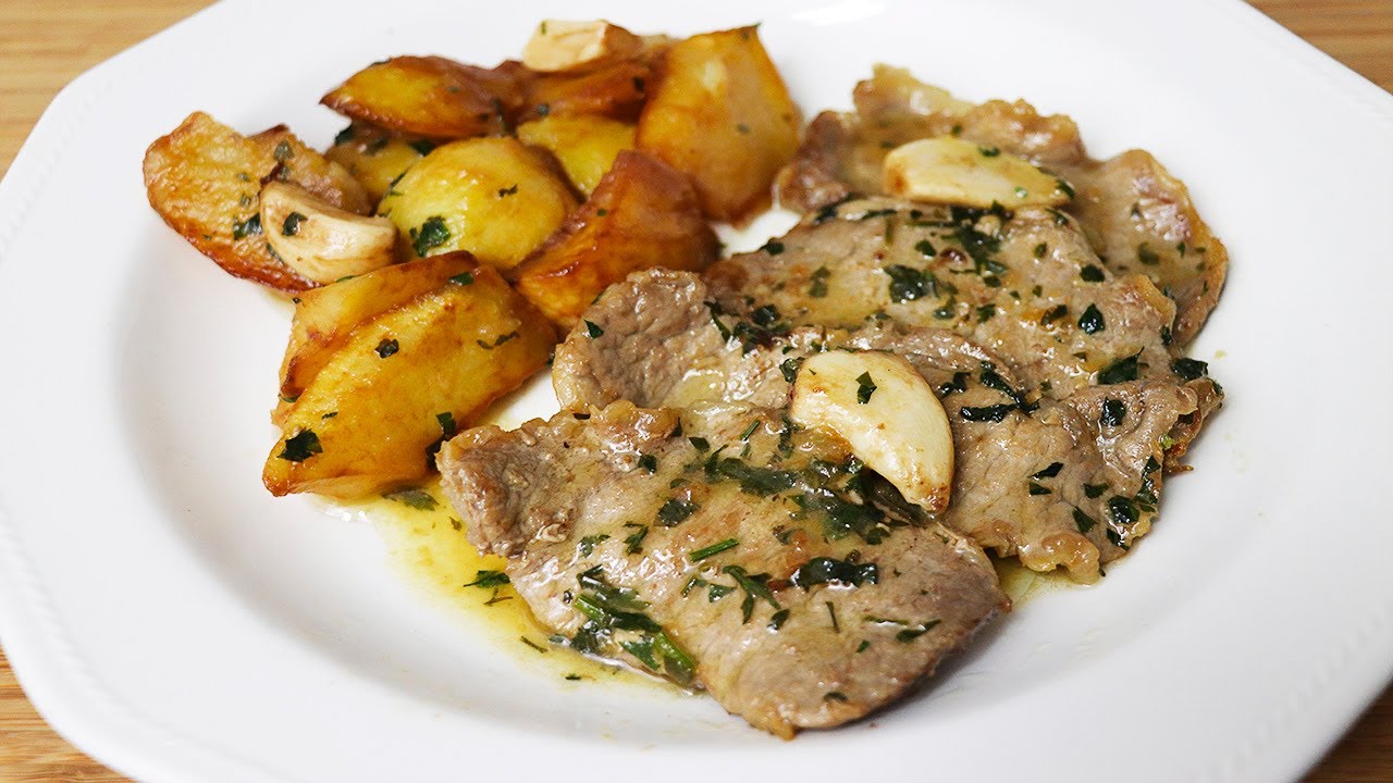 Filetes de lomo al ajillo con patatas