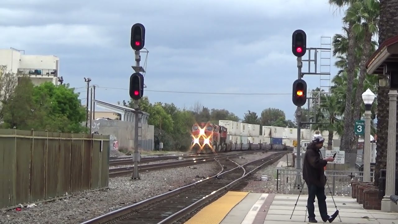 Gives A Toot Of A Horn Salute; BNSF Stack Train Hurries Empties Thru Fullerton To The Ports