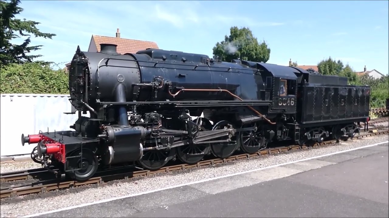 S&D 53808 AND USA 6046 DOUBLE HEAD A TRAIN OUT OF MINEHEAD WSR