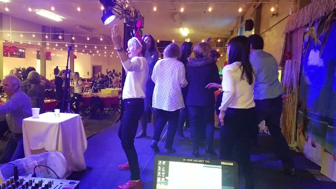 DJ Tolteca @ Soroptimist Silent Auction with Leslie Sbbroco host of Check Please! PBS.