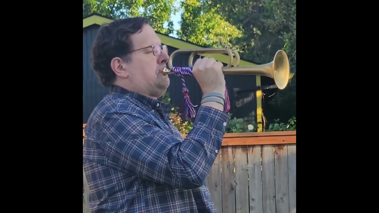 D Day 6/6.  Playing TAPS with the bugle upside down to commemorate the WW2 marine in my post.