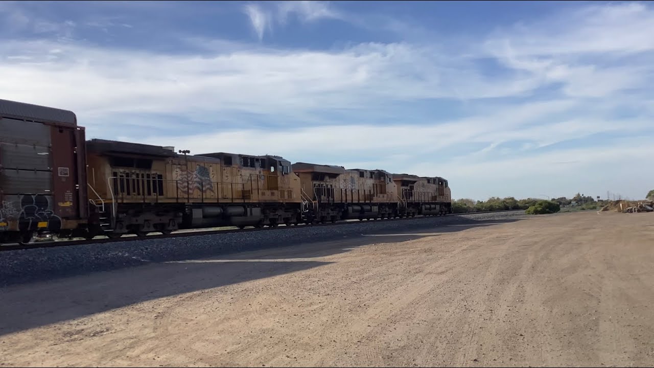UP 7658 leads a WB at Ellsworth Rd passing downtown Queen Creek 2/10/26