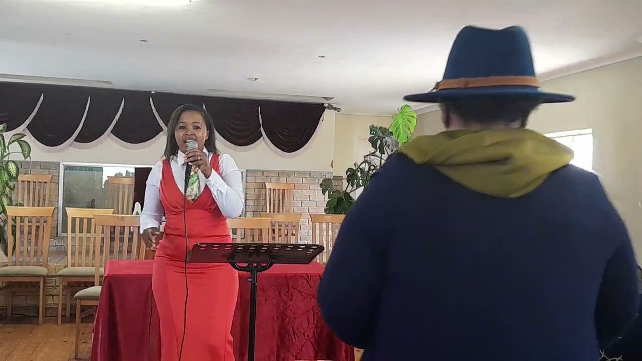 Song service by Mrs Nondanyana 