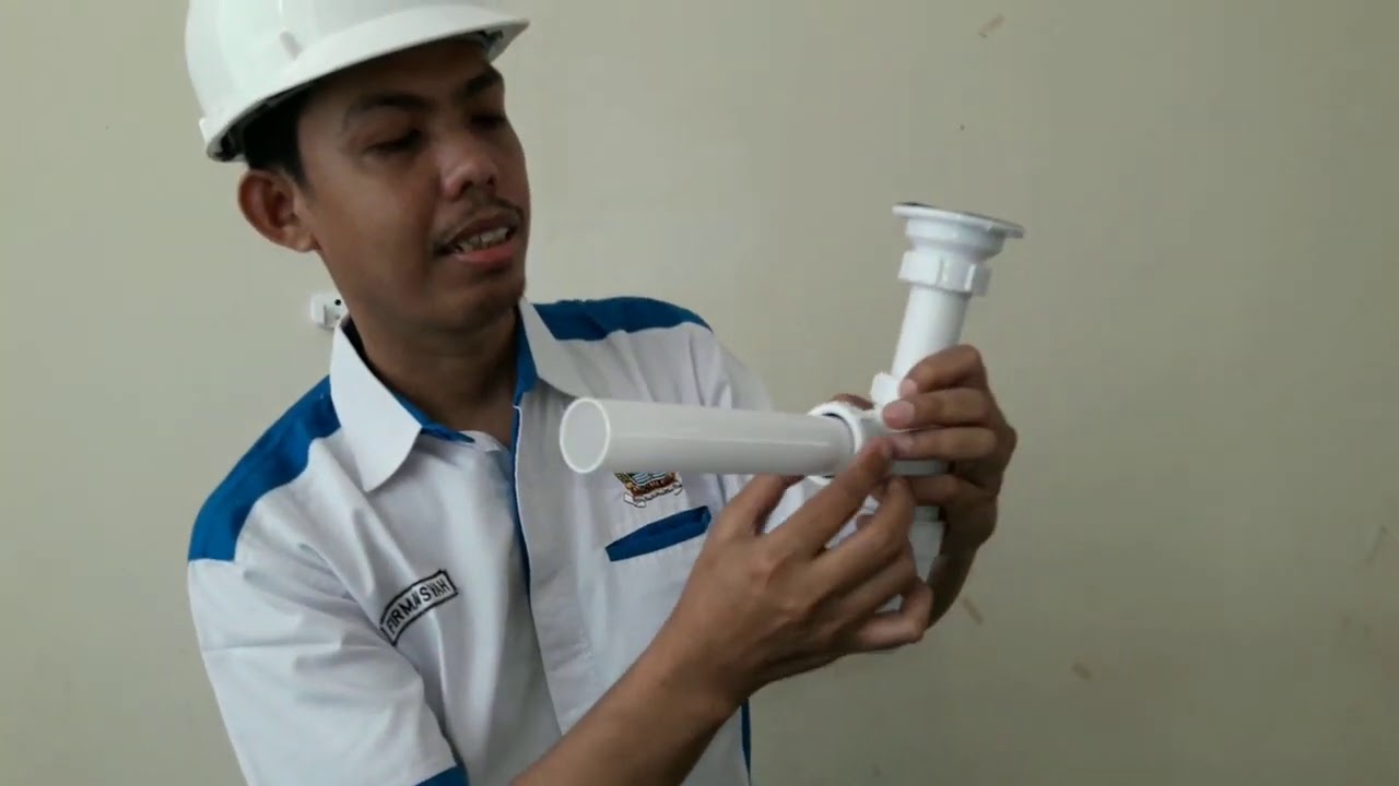 Memasang Perangkap Pipa Air Limbah Pada Wastafel (water trap) Model Botol